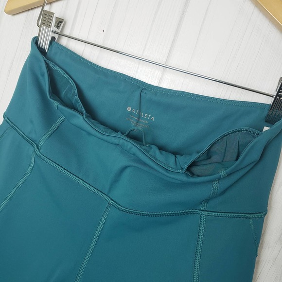 Athleta Size M‎ Lighting Capri Leggings Stash Pockets Mesh Reflective Strip Teal - Picture 9 of 12